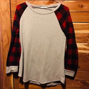 Long sleeve buffalo plaid shirt.